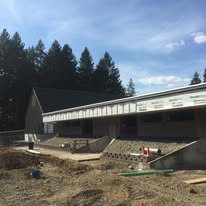 Steel roofing going up on a commercial job site